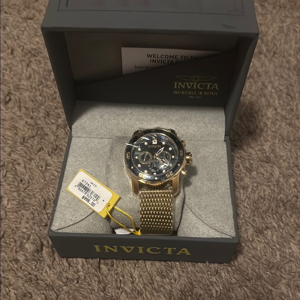 Invicta Gold and Black Chronograph Watch